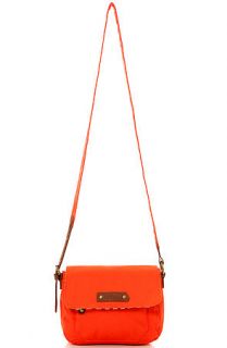 The Volcom Date Night Crossbody Bag In Electric Orange