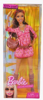 Barbie Year 2009 Fashionistas Series 12 Inch Doll with 100+ Poses   ARTSY African American Barbie with Pink Dress, Sunglass, Necklace, Purse, Belt and Pair of Boots (R9883) Toys & Games