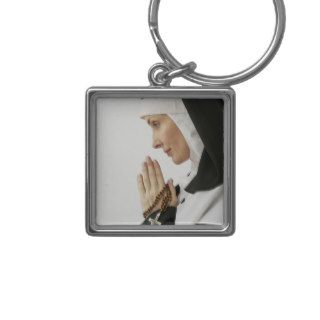 Praying Nun Holding Rosary Keychain