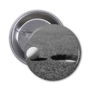 Golf Ball beside hole Button