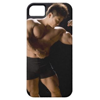 Male bodybuilder flexing muscles, front view, iPhone 5 case