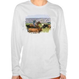 A rancher on horseback during a cattle roundup tshirt