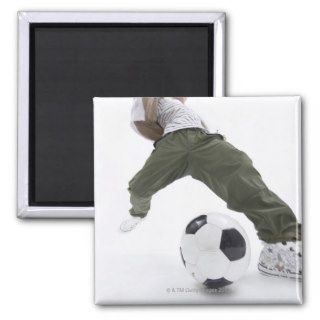 Young man playing soccer 2 fridge magnet