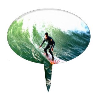 longboard surfer drops with wave cake picks
