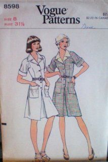VINTAGE Pattern 8598 Misses Dress    Size 8    Bust 31.5"   Mid knee length dress has fitted bodice gathered at back into one piece yoke, notched collar, front buttoned closing and above elbow length set in kimono sleeves with turn back cuffs. A line 