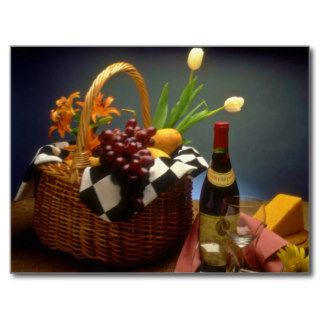 Yellow Picnic basket with wine, cheese, bread and Post Card