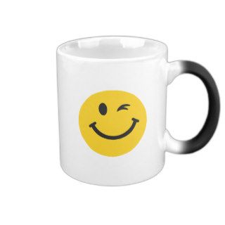 Winking smiley face mugs