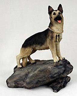 German Shepherd on Rock Statue  