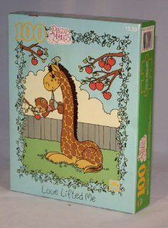 Precious Moments Golden 100 Piece Puzzle   Love Lifted Me Featuring a Giraffe Holding a Baby Monkey While It Reaches for an Apple off a Tree Toys & Games