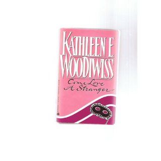 Come Love a Stranger Kathleen E. Woodiwiss 9780380899364 Books