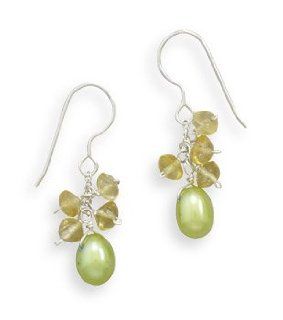Green cultured freshwater pearl and citrine earrings hang from french wires. Earrings hang approximately 31mm. Citrine pieces measure 4.5mm. Pearls measure 6mm. Necklace Jewelry