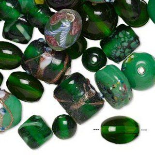 Dark green with fancy finish lampworked glass mixed beads 7x4mm 14x11mm mixed shapes Sold per pkg of 100 grams, approximately 60 100 beads