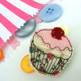 leather appliqued cupcake brooch by tugba kop illustration