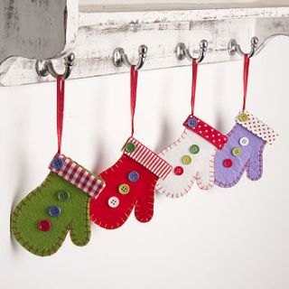 set of christmas tree decoration mittens by the contemporary home