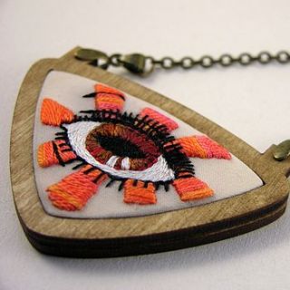 embroidered evil eye pendant by mother eagle