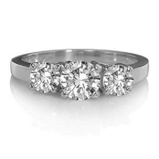 white gold diamond trilogy ring by diamond affair