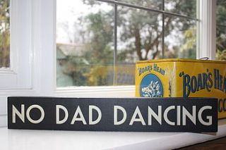 'no dad dancing' sign by the original home store