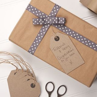 brown gift tags with string by the contemporary home