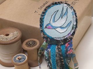 swallow embroidered rosette brooch by samantha peare embroidered textiles