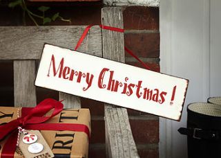 merry christmas sign by the contemporary home