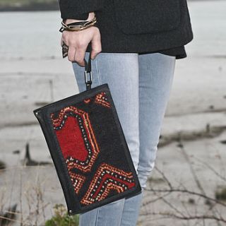 leather and vintage carpet scarlet clutch bag by lion house handbags