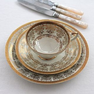 gold and white vintage cup, saucer and plate by magpie living