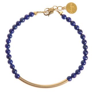 the gold bar bracelet in lapis lazuli by chupi