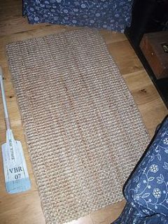 large jute rug by the hiding place