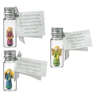 three fair trade message angels in bottles by traidcraft