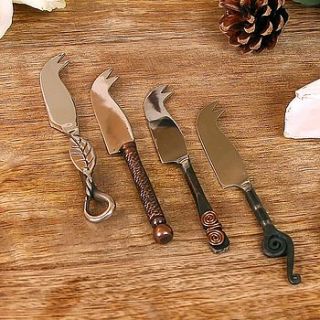 set of four cheese knives by dibor