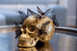 23.five ct gold leaf decorative skull by maison privée