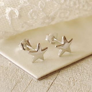 tiny silver star earrings by highland angel
