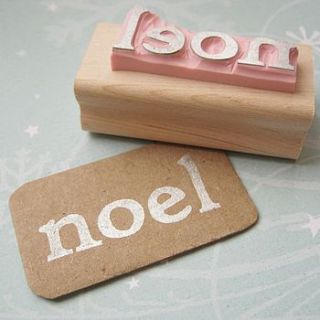 'noel' hand carved rubber stamp by skull and cross buns