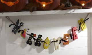 wooden halloween garland by the contemporary home