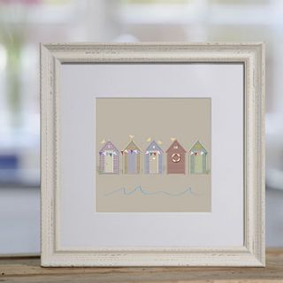 seaside huts framed print by sophie morrell