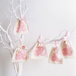 set of five camellia print gift pouches by nuvonova