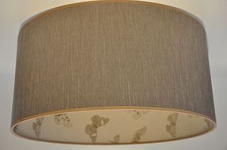light brown fabric with butterfly inner by stem lighting