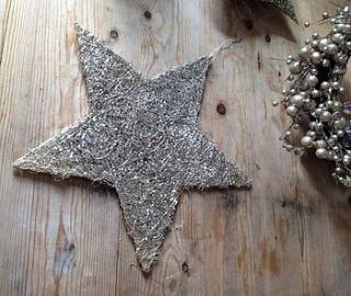 gold glitter hanging star by the hiding place