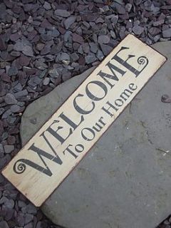 welcome to our home sign by the hiding place
