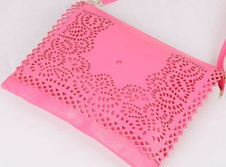 pink laser cut out bag by sugar + style
