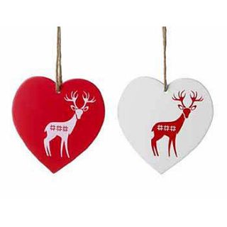 two wooden nordic hearts by the country heart store