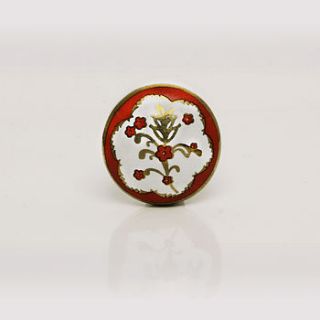 red and white round ceramic poitier decorative knob by trinca ferro