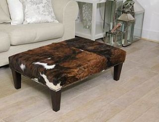 tri colour cowhide footstool by london cows