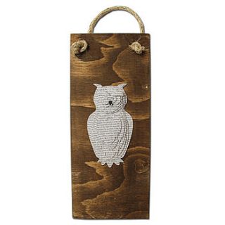 owl in print on dark wood by lindsay interiors