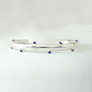 sterling silver blue sapphire kusi bangle by geronimo jones