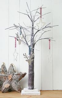 snow covered twig tree by country touches