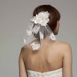 short lace bridal veil with silk flower by melanie potro bridal couture