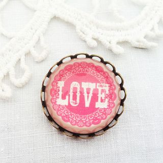 pink glass 'love' brooch by pomegranate prints
