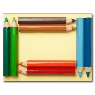 Color pencils forming a rectangle frame postcards