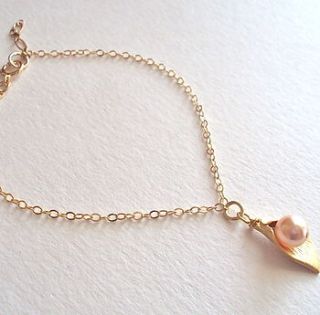 gold calla lily bracelet by a box for my treasure